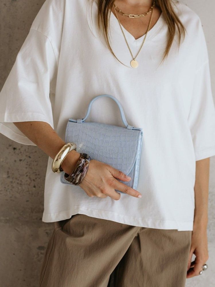 MICRO BRIEFCASE NACRE ICE BLUE CROCO